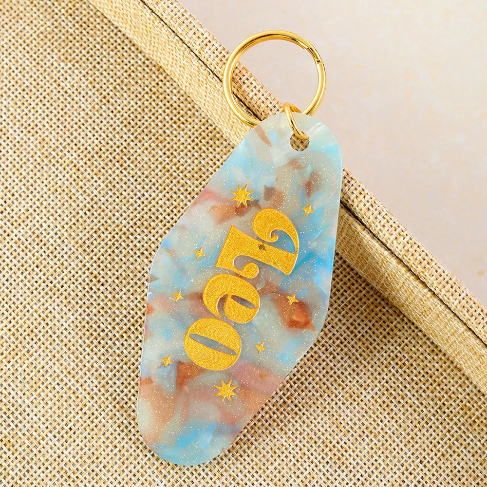 Personalized zodiac motel keychain